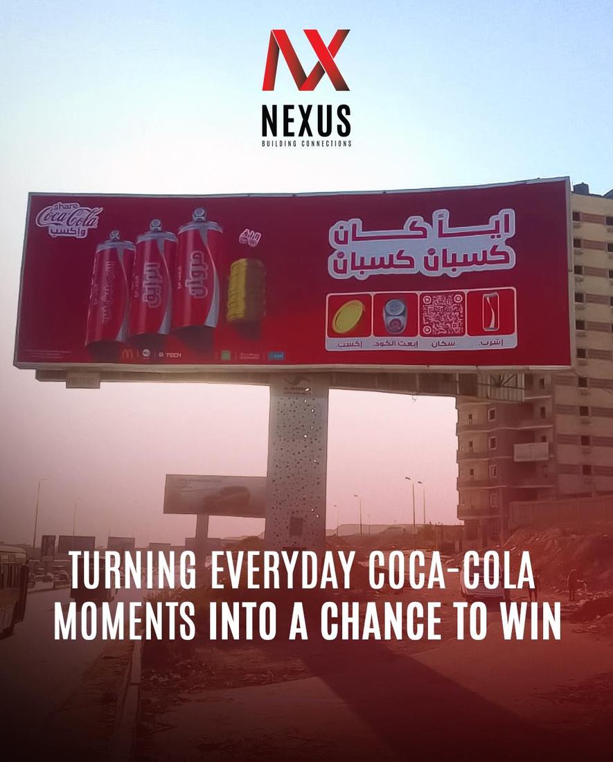 Coca-Cola campaign board on a high-traffic route